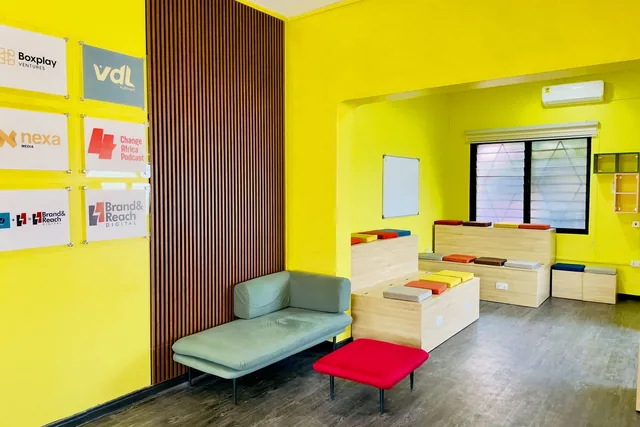 The lounge end, with the timber wall and the members’ marks.